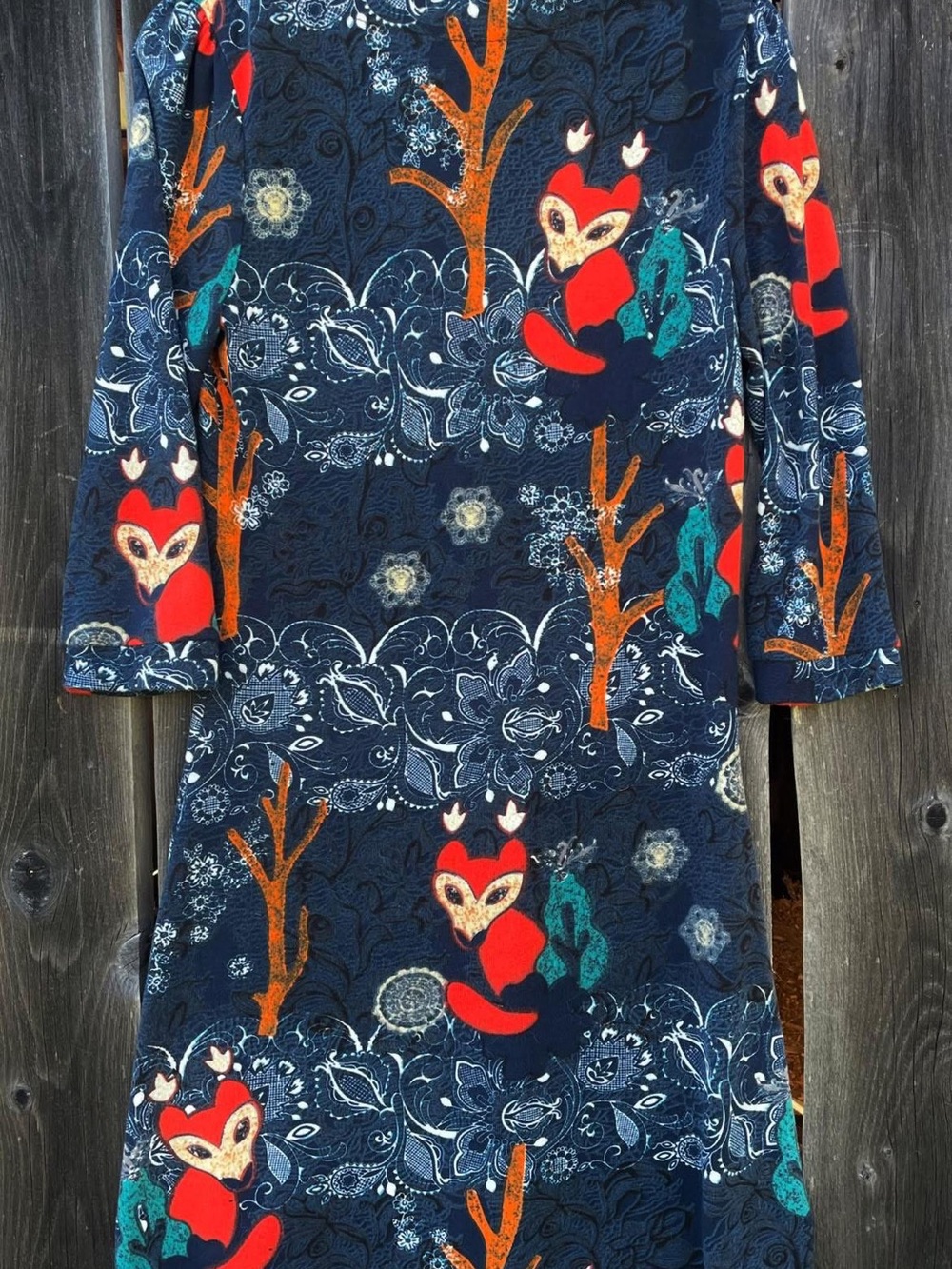 Charming Papillon Navy Dress with Red Fox and Teal Accents.